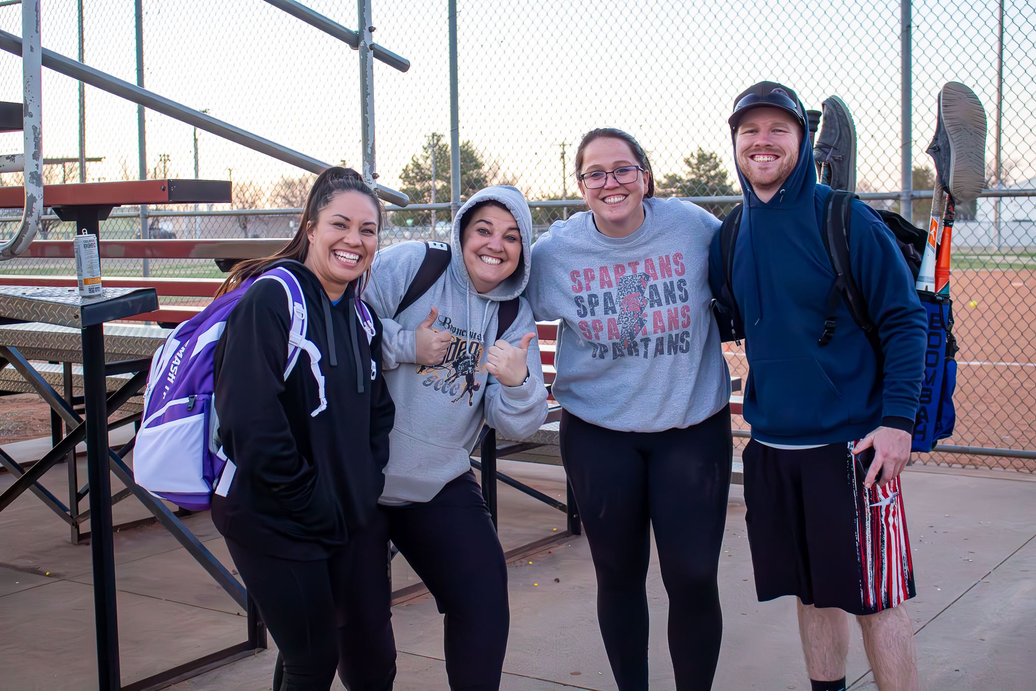 Softball players smiling